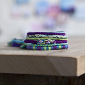 Stack of Loopdedoo Bracelets showing off designs
