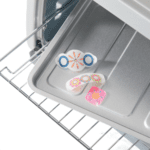 Spirograph Shrink Charms - charms baking in oven