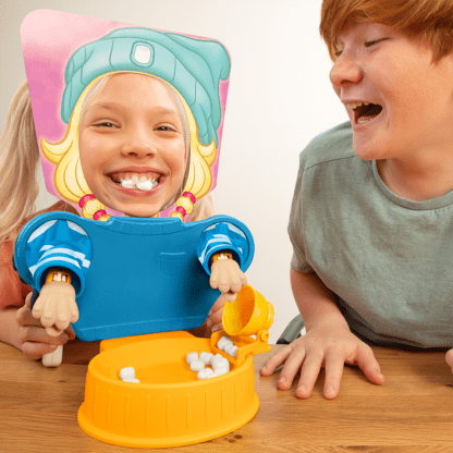 Kids playing Marshmallow Madness game