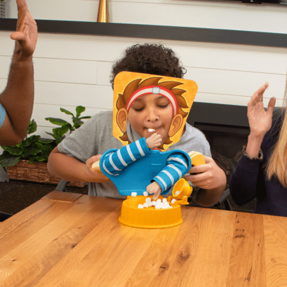 Boy playing Marshmallow Madness game